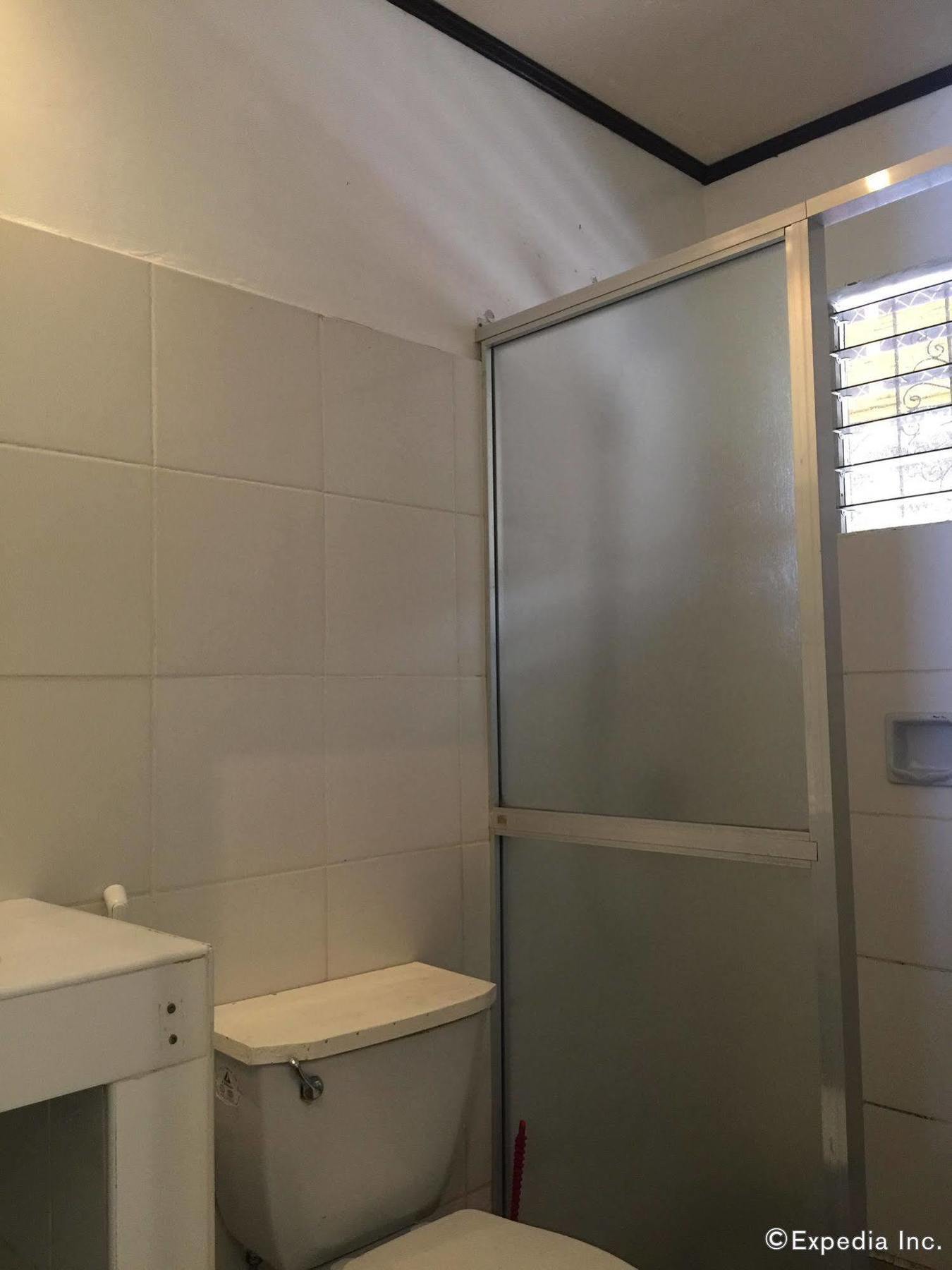 Reddoorz Premium @ Flower Beach Anda מראה חיצוני תמונה